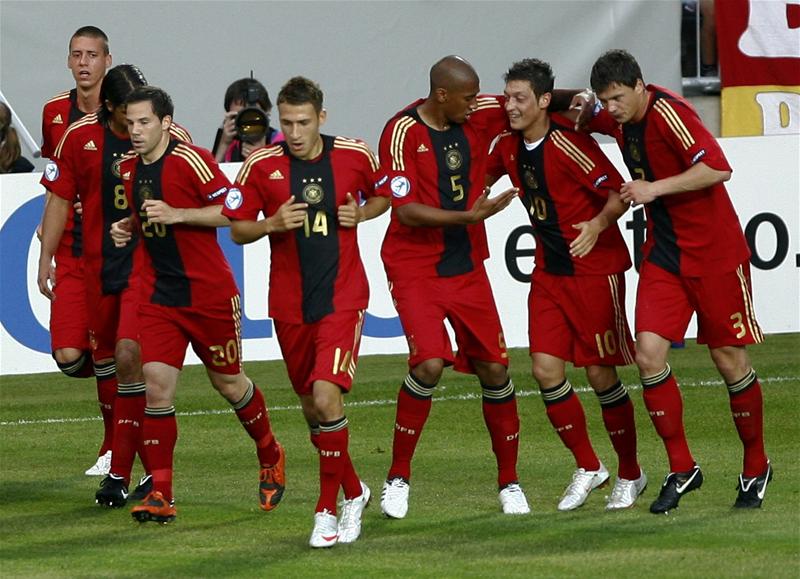 Gonzalo Castro is congratulated by his team-mates after giving Germany the lead.